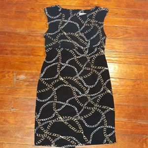Womens size 10 Black mid dress with chain designs